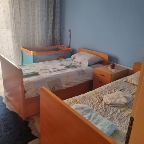 Postel nebo postele na pokoji v ubytování Apartman Mina