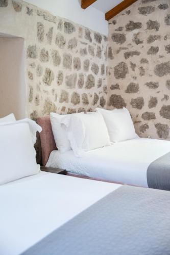 Cama o camas de una habitación en GuestHouse Mrshe Palace