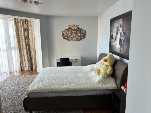 Ένα ή περισσότερα κρεβάτια σε δωμάτιο στο Cozy apartment in Chisinau Great Location!
