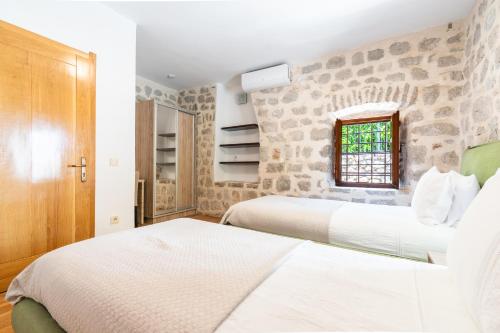 Cama o camas de una habitación en GuestHouse Mrshe Palace