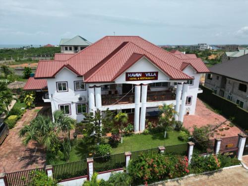 an aerial view of a house with a red roof at Haven Villa in Apowa