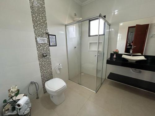 Et badeværelse på Chácara Recanto do Sossego - Monte Sião