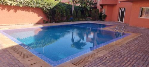 Bazén v ubytování Beautiful apartment with pool 1 min far from beach nebo v jeho okolí