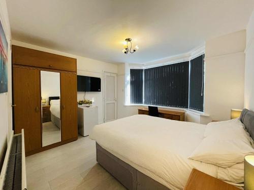 Ένα ή περισσότερα κρεβάτια σε δωμάτιο στο Studio-like room with own entrance