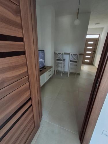 Μια τηλεόραση ή/και κέντρο ψυχαγωγίας στο Tims apartment