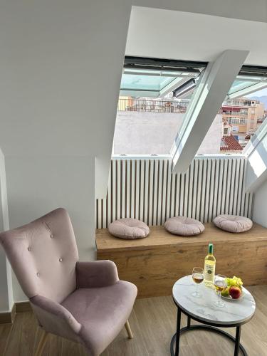 A top-floor modern apartment Located 100 meters from the beach