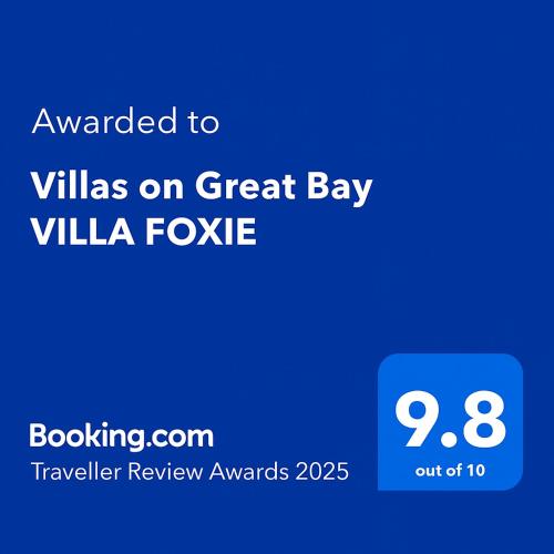 a screenshot of a cell phone with the text awarded to villas on great bay at Villas on Great Bay VILLA FOXIE in Philipsburg