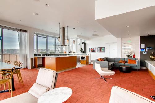 a living room with a couch and a table at Speechless In Seattle - #1 Location - 2BR - Free Parking - VR1 in Seattle