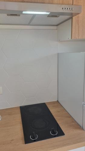 Η κουζίνα ή μικρή κουζίνα στο Joli appartement