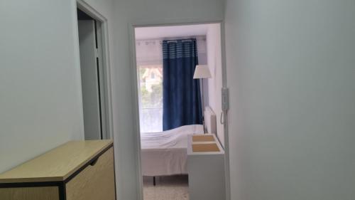 Ένα ή περισσότερα κρεβάτια σε δωμάτιο στο Joli appartement