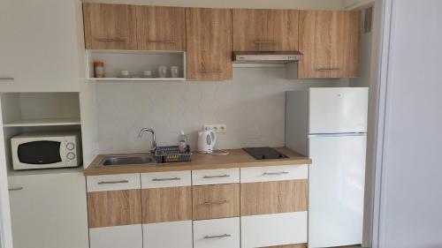 Η κουζίνα ή μικρή κουζίνα στο Joli appartement