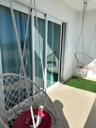 Ένα ή περισσότερα κρεβάτια σε δωμάτιο στο Vista al Caribe