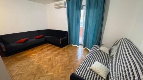 Postel nebo postele na pokoji v ubytování Porto Novi, Djenovici
