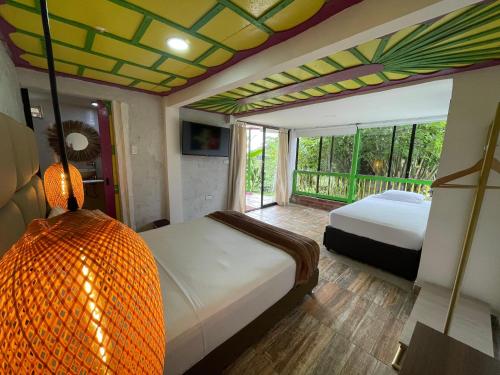 Postel nebo postele na pokoji v ubytování Dreams Hotel y Restaurante