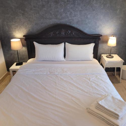 Cama o camas de una habitación en Cozy Studio in Casablanca ( 1.1 km from Casavoyageurs station )