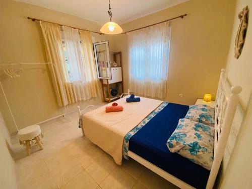 Ένα ή περισσότερα κρεβάτια σε δωμάτιο στο Seaside Villa Efi