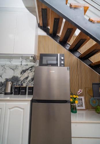 Dapur atau dapur kecil di Fully furnished 2BR Perfect Base for your Getaway!