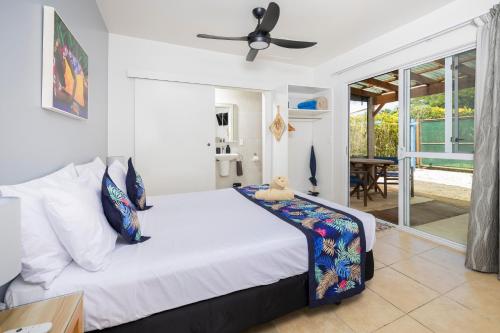 Postel nebo postele na pokoji v ubytování Rarotonga Daydreamer Escape