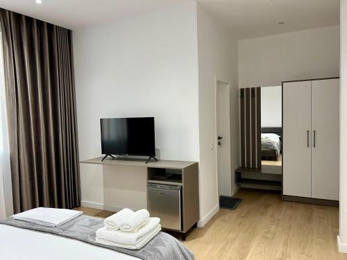 Ένα ή περισσότερα κρεβάτια σε δωμάτιο στο Villa Malaj 2