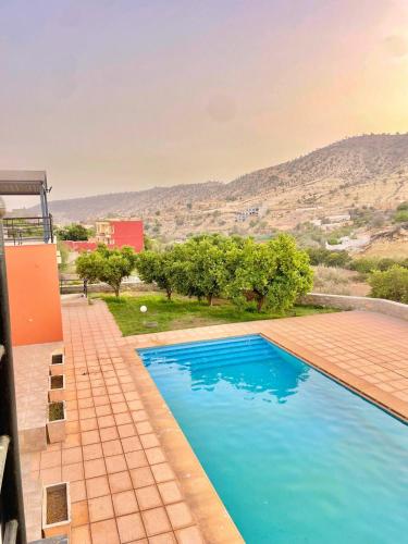 Bazén v ubytování Agadir Tighanimine maison avec piscine dans une ferme nebo v jeho okolí