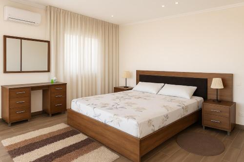 Giường trong phòng chung tại Inactive