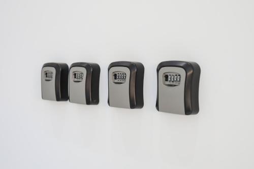 a set of four usb ports on a white background at Divos Apartments in Vlorë
