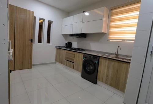 Kuchyň nebo kuchyňský kout v ubytování Luxe Haven