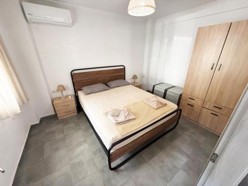 Postel nebo postele na pokoji v ubytování Thassos Forrest View Apartment