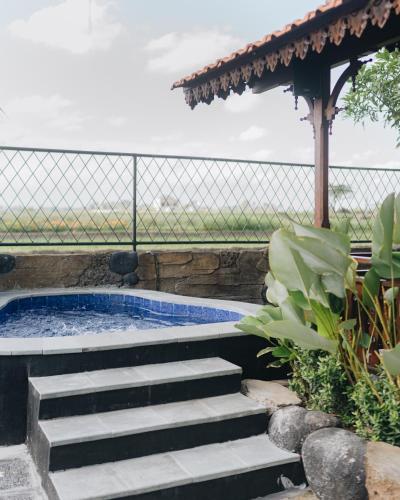 Сад в Banjar Segara Villa & Guesthouse - Kelating