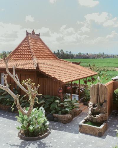 Сад в Banjar Segara Villa & Guesthouse - Kelating