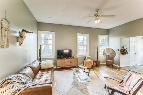 a living room with a couch and a tv at Old School Charm | Sleeps 6 in Buchanan