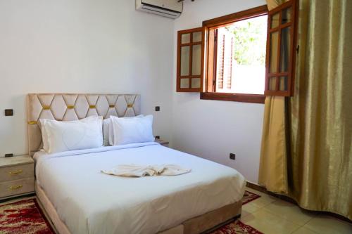 Postel nebo postele na pokoji v ubytování Marrakesh villa 1