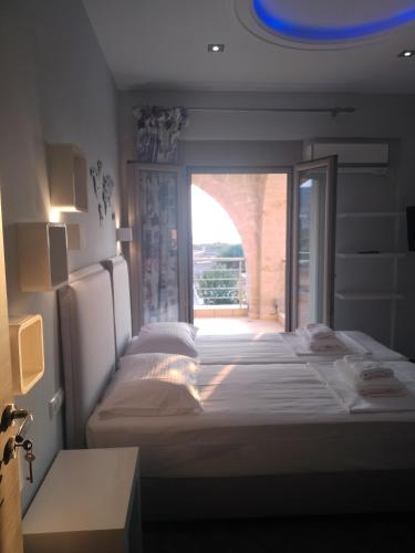 Katil atau katil-katil dalam bilik di Sea View Villa