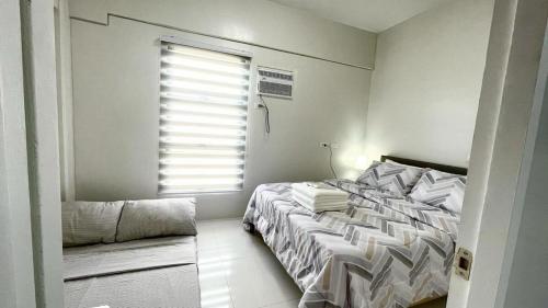 Postel nebo postele na pokoji v ubytování Panglao-Island Condo Unit Rental 1
