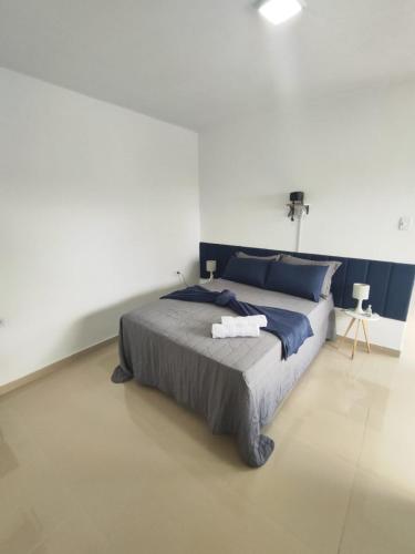 Ένα ή περισσότερα κρεβάτια σε δωμάτιο στο SunVale Loft