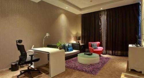 Χώρος καθιστικού στο Harbin Ju Jian Hotel