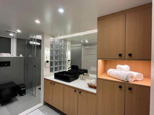 a kitchen with a counter with towels on it at The Erina House in Darjeeling
