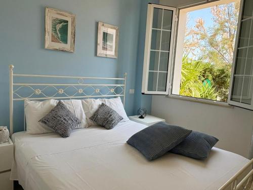 Giường trong phòng chung tại Villa Dolcevita