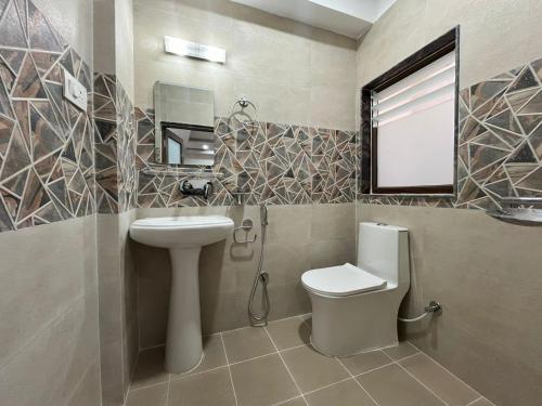 Un baño de Patan Stay by SAMS