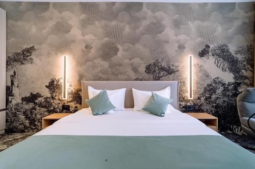 Postel nebo postele na pokoji v ubytování ARIS Boutique Hotel & SPA