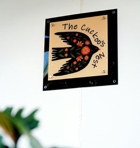 a sign that reads the angelos are on at The Cuckoo's Nest in Linkside