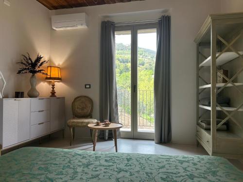 Ένα ή περισσότερα κρεβάτια σε δωμάτιο στο Casale21