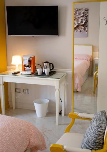 Ένα ή περισσότερα κρεβάτια σε δωμάτιο στο Top Central Rooms