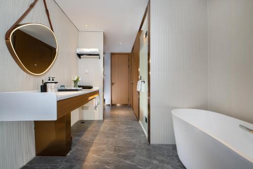 Koupelna v ubytování Huizhou Zhongkai Hi-Tech Zone Meihua Hotel