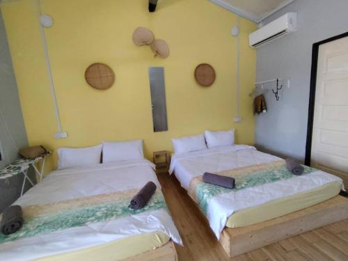Ένα ή περισσότερα κρεβάτια σε δωμάτιο στο Tamu Chalet