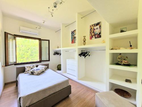 Postel nebo postele na pokoji v ubytování Villa Patrizia