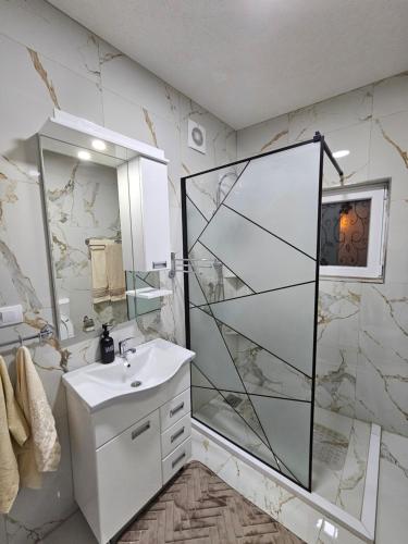 Koupelna v ubytování Rejjan APARTMANI