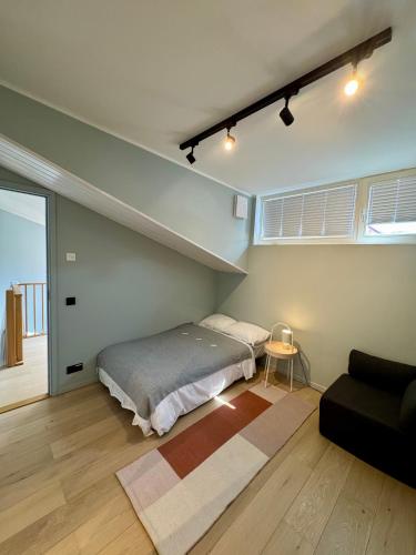 Llit o llits en una habitació de Saue Apartment