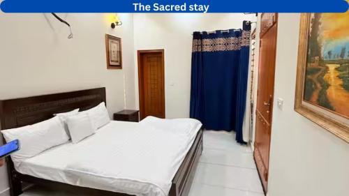 Katil atau katil-katil dalam bilik di Sacred stay