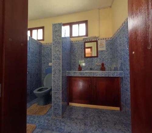 Ένα μπάνιο στο Le Tropical Chez Jeannette